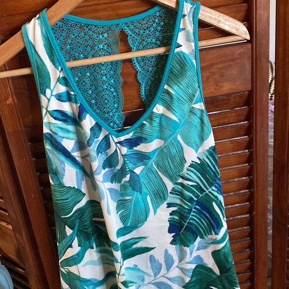 Teal aqua white with some navy in it